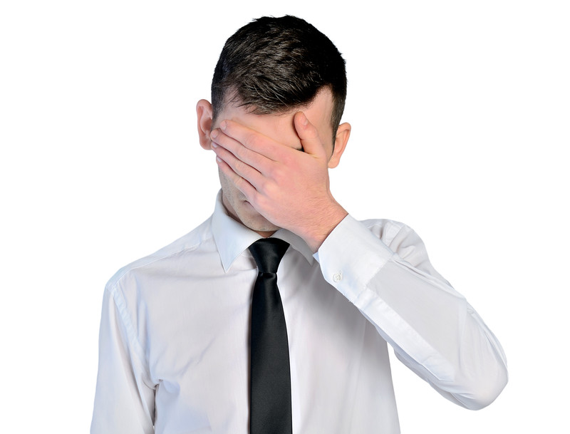 landlord with hand over face